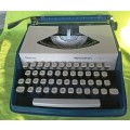 Vintage Remmington Envoy III Typewriter in Carry Case-Good condition and working