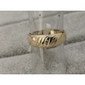 Detailed Gold Ring With Diamonds