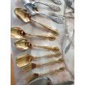 collection of spoons gold plated 24 carat etc - vintage read