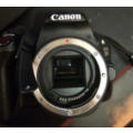 Canon Eos 200D with 24 mm F2.8 stm lens and accessories touch screen good condition