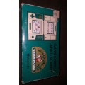 Nintendo vintage Green house game in box.