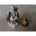Two Cute Buddha`s One Ceramic the other Ivory