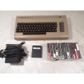 Super Collectable!! Commodore 64 computer, Power Supply, Original Cartridge & Gaming Tapes (Working)