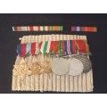 WW2 Medal Group, Insignia and Documents Awarded To: 158401 PTE. (GUNNER)  K.W. COTTERRELL