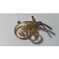 Faux Pearl and Gold Tone Swirl Brooch