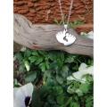 Stainless steel baby feet pendant on clasp