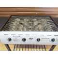 Large 4 burner gas braai, like new with wheels and side tables