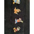 4 WALT DISNEY CHARACTERS BADGES IN MINT CONDITION