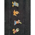 4 WALT DISNEY CHARACTERS BADGES IN MINT CONDITION
