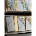4 SETS OF 6 EACH IN ABOXNAMEPLATES MADE OF PORCILIN AND FLORAL DECORATED