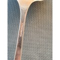 A SILVER PLATED SOUP LADEL IN PERFACT CONDITION STAMPED COMMUNITY