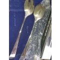 A SET OF GENUINE SILVER PLATED SALAD SPOON AND FORK SET
