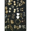 A COLLECTION OF VINTAGE EARRINGS FOR WOMAN SOLD AS IS
