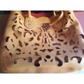 A  BROWN VIRTUALLY BRAND NEW MICHEAL KORES LEATHER TYPE HAND BAG