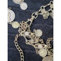 A VINTAGE ORNATE COIN BRONZE NECKLACE WITH 2 COINS LOOSE SOLD AS IS
