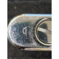 A RENAULT CIGGARETTE LIGHTER SOLD AS IS