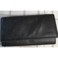 A GENUINE BUSBY USED BLACK LEATHER WALLET SOLD AS IS