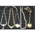 A JOBLOT VIA ROTHSTEIN DESINGNER NECKLACES SOLD AS IS