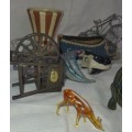 A VINTAGE COLLECTION OF MINITURE MIXED FIGURINES SOLD AS IS