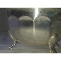 A VINTAGE SILVER PLATED SAUCE BOAT AND LADEL SOLD AS IS