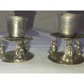 2 X VINTAGE SILVER PLATED CANDLE STANDS WITH MONKEY FIGURINES SOLD AS IS