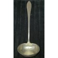 A VINTAGE METAL  SOUP LADEL FOR CATERERS OR COLLECTORS SOLD AS IS