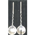A SET OF VINTAGE STAINLESS STEEL SALAD SPOONS SOLD AS IS