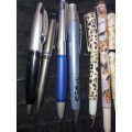 A COLLECTION JOBLOT ROLLER BALL PENS AND PENCILS SOLD AS IS NOT TESTED