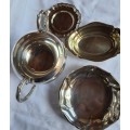 A COLLECTION OF SMALL SERVING TRAYS AND A ROMAN STYLE SAUCE JUG