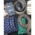 A JOBLOT VINTAGE COSTUME BRACELTES SOLD AS IS