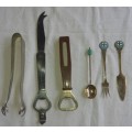 A VINTAGE COLLECTION OF BOTTLE OPENERS