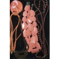 A VINTAGE COLLECTION OF ELEGANT COSTUME NECKLACES SOLD AS IS
