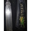 TWO VINTAGE LETTER OPENERS  SOLD AS IS