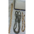 A COLLECTION OF GENUINE NATURAL  PEARL NECKLACES SOLD AS IS