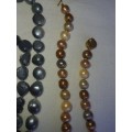 A COLLECTION OF GENUINE NATURAL  PEARL NECKLACES SOLD AS IS
