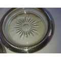 A VINTAGE SET OF FIVE GLASS COASTERS WITH SILVER PLATED BRIMMS SOOD AS IS