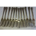 A vintage set of 12 desert forks Sold as is