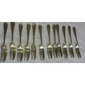 A JOBLOT VINTAGE STAINLESS NICKLE SILVER DESERT FORKS SOLD AS IS