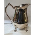 AN IMMACULATE CONDITION ROMAN STYLE SILVER PLATED JUG WITH ORNATE LEGS SOLD AS IS
