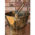 A VINTAGE DECORATIVE BRASS 5LT BUCKET SOLD AS IS