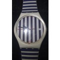 A COLLECTORS SWATCH WATCH IN WORKING ORDER SOLD AS IS