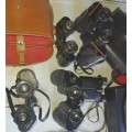 A VINTAGE JOBLOT COLLECTION OF BINOCULARS ALL WORKING SOLD AS IS