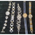 A COLLECTION OF WOMANS DRESS WATCHES SOLD AS IS NOT TESTED