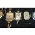 A COLLECTION OF ANTIQUE WOMANS WATCHES SOLD AS IS NOT TESTED