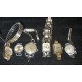A COLLECTION OF VINTAGE AND ANTIQUE WOMANS WATCHES SOLD AS IS NOT TESTED [ E1]