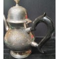 AN ANTIQUE SILVER PLATED TEA POT JUG SOLD AS IS