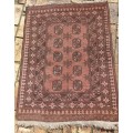 A VINTAGE PERSIAN CARPET USED DIAMENSIONS 42X32 INCHES APPROXIMATELY, IT IS A FAIRLY GOOD CONDITION