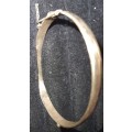 A SINGLE VINTAGE GOLD  9CT BRONZE CORE BRACELT IN GOOD CONDITION SOLD AS IS