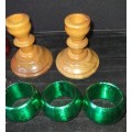 A GENUINE SET OF TWO PJ VAN RHEENEN STINK WOOD CANDLE STANDS AND A SET OF SIX MULTI COLOURED NAPKIN