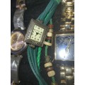 A JOBLOT FANCY WOMANS DRESS WATCHES SOLD AS IS NOT TESTED